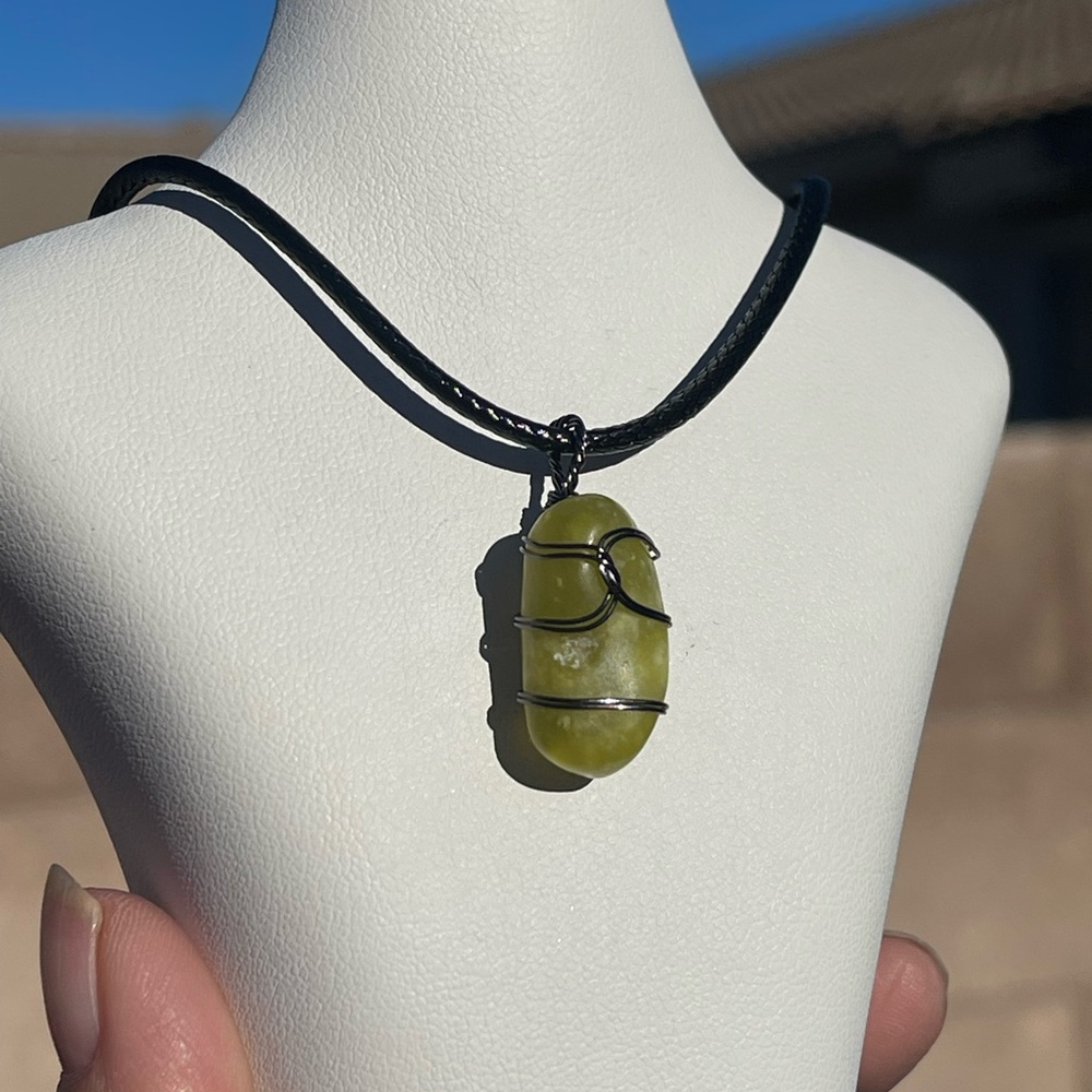 Lime- is a green stone wire wrapped pendant